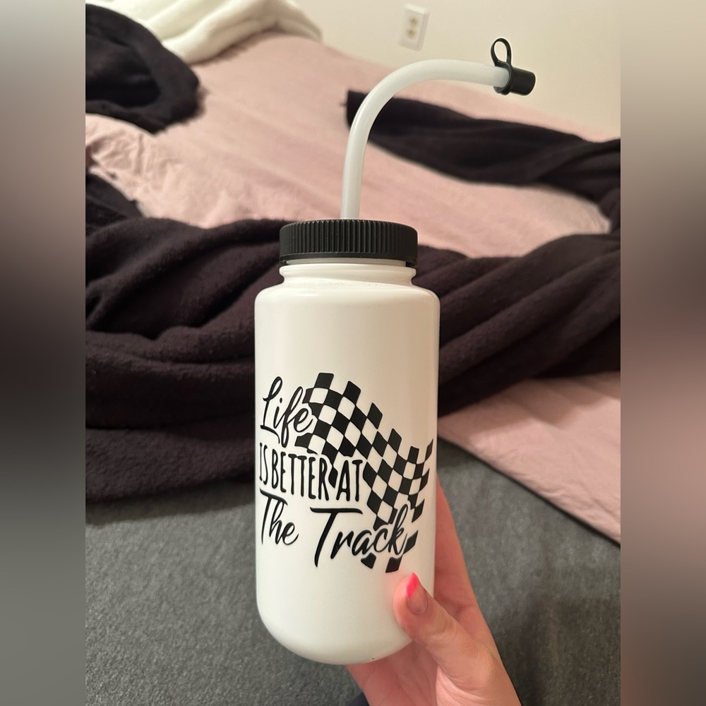 life is better at the race track water bottle